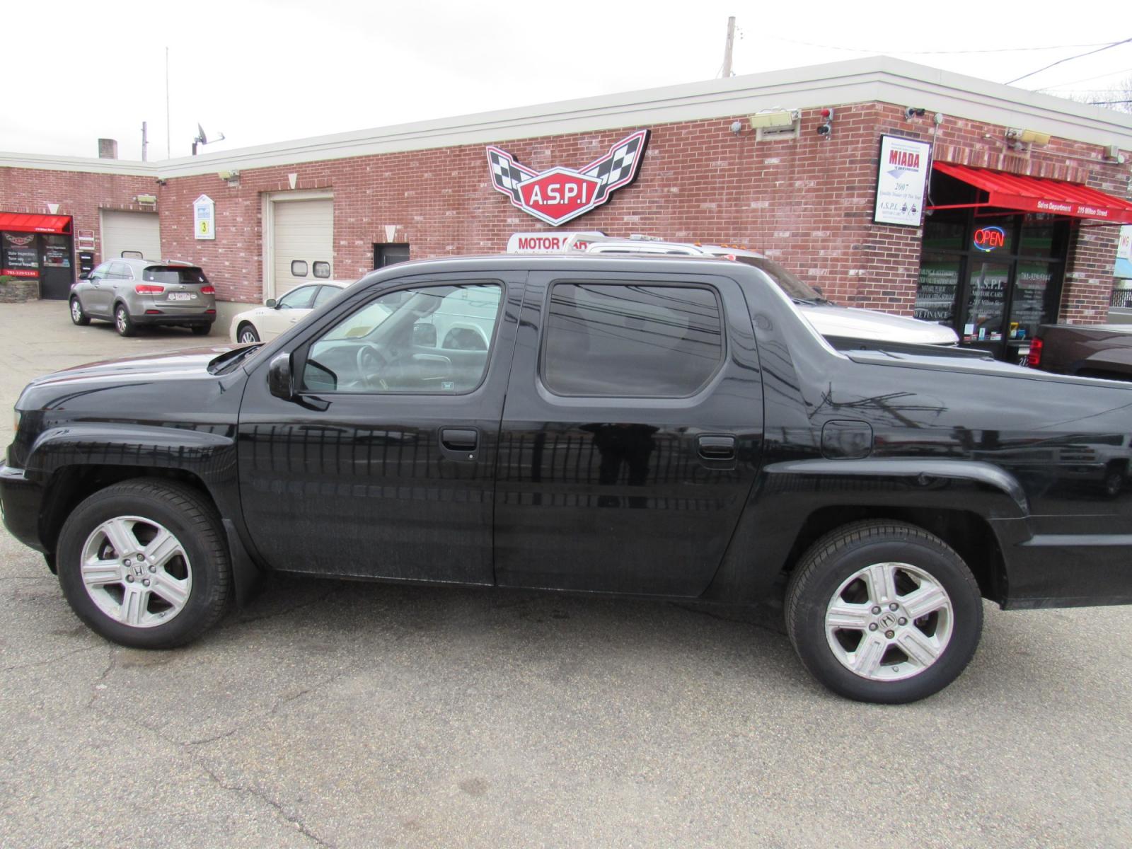 2012 BLACK /Gray Honda Ridgeline RTL (5FPYK1F56CB) , Automatic transmission, located at 215 Milton St, Dedham, MA, 02026, (781) 329-5144, 42.241905, -71.157295 - This nice Ridgeline is in excellent condition. Runs like new. All ASPI Motor Cars vehicles are fully serviced before they are delivered to assure the highest quality used vehicles. Comes with a 3/3 warranty included in the price. call for details. Prices on all vehicles do not include $299.95 Doc - Photo #1